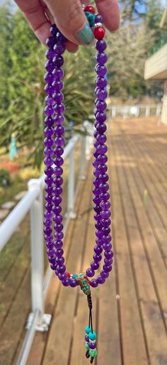 An amethyst prayer bead would be a beautiful and spiritually significant tool for meditation and prayer. Amethyst is a violet variety of quartz crystal known for its calming and purifying properties. It is believed to aid in meditation, enhance spiritual awareness, and promote inner peace and healing. Amethyst prayer beads, also known as mala, are used in various spiritual practices to count repetitions of mantras or prayers. the soothing energy of amethyst can help the practitioner to focus the Spiritual Crystal Necklaces With 8mm Beads, Lavender Amethyst Crystal Necklaces With Round Beads, Spiritual Amethyst Round Beads Crystals, Spiritual Lavender Gemstone Crystals, Lavender Gemstone Crystals For Spiritual Use, Purple Natural Stones Crystal Necklace For Healing, Amethyst Crystal Necklace With Round Beads, Amethyst Crystal Necklaces With Round Beads, Spiritual Lavender Crystals