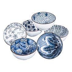 six blue and white bowls with designs on them