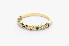 "14k Gold Art Deco Emerald and Diamond Half Eternity Womens Wedding Ring / Stackable Emerald Diamond Ring / May Birthstone Ring / Christmas Ferkos Fine Jewelry Item Details ✔ Made to Order ✔ Gold Kt: 14K (also available in 18K) ✔ Available Gold Color: Rose Gold, Yellow Gold, White Gold ✔ Round Diamond: 8 pcs 1.25 MM ✔ Round Emerald: 5 pcs 1.85 MM ✔ Number of Stones: 13 ✔ Total Diamond ctw: 0.08 Ctw ✔ Total Emerald ctw: 0.15 Ctw ✔ Diamond Color-Clarity: G Color SI Clarity ✔ Width of Band: 1.4MM ✔ Elegant Gold Emerald Ring For Wedding, Elegant Gold Emerald Wedding Ring, Elegant Stackable Emerald Rings With Bezel Setting, Elegant Half Eternity Emerald Ring For Anniversary, Gold Emerald Ring With Bezel Setting For Wedding, Elegant 14k Gold Eternity Band With Halo, Elegant Halo Eternity Band In 14k Gold, Elegant Yellow Gold Eternity Band With Gemstone, Elegant Half Eternity Emerald Ring