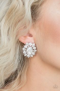 Varying in size, glittery white rhinestones and ornate silver accents burst from a dramatic white gem center for a stellar look. Earring attaches to a standard post fitting. Sold as one pair of post earrings. P5PO-WTXX-136XX Rhinestone Earrings Studs, Statement Bridal Earrings, Wedding Earrings Studs, Bridal Earrings Studs, Bridal Statement Earrings, Wedding Studs, Crystal Earrings Wedding, Bridal Pearl Necklace, Crystal Bridal Earrings