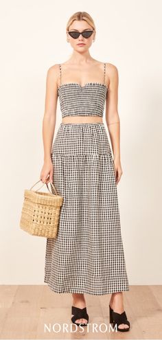 Gingham checks pattern a stylish two-piece dress with a smocked crop top and a flowing ankle-length skirt. Geometric Outfit, Linen Two Piece Set, Dresses Two Piece, Checks Pattern, Checkered Skirt, Ankle Length Skirt, Hottest Fashion Trends, Two Piece Dress, Piece Dress