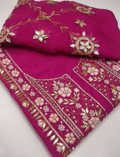 Item Overview ATHARVA Hand Embroidered Salwar Kameez w/Magenta Pink Chanderi Shirt/Gota Patti Chiffon Dupatta/Custom Stitch Unstitch/Custom Anarkali Dno.CH1800 Fabric: * Shirt Chanderi Silk - Magenta Pink - 2.5 Mts Hand Embroidered Neck/ Gota Patti * Dupatta: Chiffon Chinnon Dupatta/ All over Gota Work/2.5 Mts * Bottom Santoon Silk Taffeta 2.5 Mts. Excusive Hand Embroidered Party Wear Punjabi Suit. 🌷CUSTOMIZATION (No Extra Charges) * Fabrics Customization: Designs Can be made in different Fabri Pink Georgette Churidar With Cutdana, Pink Cutdana Georgette Churidar, Semi-stitched Georgette Salwar Kameez With Dori Work, Anarkali Churidar With Dori Work In Georgette, Pink Georgette Salwar Kameez With Cutdana, Festive Georgette Churidar With Cutdana, Navratri Churidar With Cutdana In Chinon, Navratri Cutdana Churidar In Chinon, Festive Georgette Churidar With Pallu