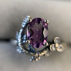 🧿Ring🧿 ✨This stunning ring is a perfect Oval cut Natural genuine Amethyst stone on a 925 adjustable band️ Mined from: Brazil  🔮*Hallmark on pictures*🔮 This ring is absolutely a must for those who love minimalist pieces but also want to make a statement. This beautiful stone is the full focus🔮 Every single one of my exquisite rings are handmade, I choose everything down to the design, crystal stone, colours and setting🍄 White Gold Amethyst Rings With Accent Stones, Fine Jewelry Sterling Silver Amethyst Promise Ring, Exquisite Amethyst Gemstone Rings, Promise Amethyst Ring In Sterling Silver, Exquisite Silver Amethyst Ring With Accent Stones, Promise Jewelry With Oval Amethyst, Purple Topaz Ring In Sterling Silver For Anniversary, Purple Topaz Anniversary Ring In Sterling Silver, Sterling Silver Oval Topaz Ring With Diamond Cut