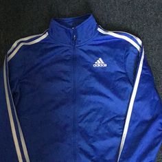 Brand New Adidas Jacket Kids , Size Y/M , Color Blue. Blue Sportswear Top With Three Stripes, Blue Hooded Outerwear With Three Stripes, Casual Blue Adidas Outerwear, Blue Adidas Long Sleeve Tops, Adidas Blue Track Jacket For Streetwear, Adidas Blue Long Sleeve Tops, Blue Three Stripes Track Jacket For Fall, Blue Sportswear Track Jacket For Fall, Blue Track Jacket For Fall Sportswear