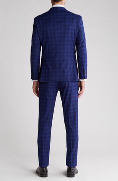 Look polished while staying comfortable in this ultrastretchy suit cut with a trim fit for a modern silhouette. 36" inseam; 7 1/2" leg opening; 10 1/2" front rise Jacket has peaked lapels; five-button cuffs; chest pocket; flap pockets; interior pockets Trousers have zip fly closure; slant pockets Jacket is lined; trousers are lined to the knee 72% polyester, 25% rayon, 3% spandex Dry clean Imported Blue Fitted Suit For Work, Fitted Blue Blazer With Flat Front, Blue Fitted Blazer With Flat Front, Blue Fitted Suit With Notch Lapel, Fitted Blue Blazer, Fitted Blue Elastane Pants, Blue Fitted Elastane Pants, Business Casual Elastane Suit With Notch Lapel, Fitted Elastane Suits With Notch Lapel