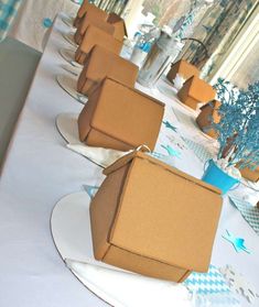 there are many boxes on the table ready to be served at a party or celebration