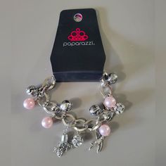 7 Inch Silver Chin Bracelet With Charms, 2 Inch Extending Chain Pink Metal Beaded Bracelets With Charms, Pink Metal Beaded Bracelet With Charms, Pink Nickel-free Charm Bracelet, Pink Chain Bracelet With Lobster Clasp, Party Charm Bracelet With Dangle, Pink Metal Chain Bracelet Gift, Pink Metal Chain Bracelet As Gift, Pink Metal Bracelets For Party, Pink Bracelet With Lobster Clasp For Party