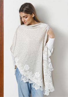 This is a classic knitted oatmeal mélange poncho crafted from a very fine wool. It is elevated with the intricate application of a contrasting ivory Chantilly lace border. Striking and stylishly warm, this poncho makes for a head turning addition to any outfit. Beige Poncho For Layering, One Size Beige Poncho For Layering, Elegant Beige Cape Poncho, Elegant Beige One Size Poncho, Elegant One Size Beige Poncho, Beige Knit Poncho One Size, Beige Knit Poncho, One-size Beige Knit Poncho, White Poncho For Layering