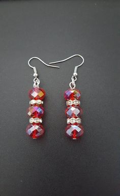 Red Faceted Dangle Earrings, Handmade Red Crystal Drop Earrings, Red Beaded Crystal Drop Earrings, Red Beaded Drop Crystal Earrings, Red Handmade Dangle Crystal Earrings, Red Handmade Crystal Dangle Earrings, Handmade Red Crystal Dangle Earrings, Crystal Earrings With Faceted Beads As Gift, Crystal Beaded Earrings For Gift