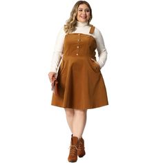 Versatile Style: This corduroy pinafore dress can be worn in different ways, making it suitable for various occasions, from casual to formal events. Trendy Design: The overall style of this dress is currently on-trend, making it a great addition to any fashion-forward woman's wardrobe. Quality Material: Made of soft and durable corduroy fabric, this dress is not only comfortable but also long-lasting, ensuring great value for money. Easy Maintenance: This dress is machine-washable, making it sim Casual Brown Pinafore Dress For Fall, Casual Corduroy Pinafore Dress For Fall, Plus Size Corduroy, Corduroy Pinafore, Corduroy Pinafore Dress, Dresses Brown, Suspender Skirt, A Line Dresses, Corduroy Fabric