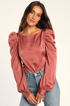 From the office to date night, the Lulus Love You Dearly Mauve Satin Long Sleeve Top is the perfect pick! Sleek satin falls from a bateau neckline, into long sleeves with button cuffs and on-trend puffed shoulders. Relaxed, darted bodice sits atop a rounded hem. Back keyhole with top button. Pair with a pencil skirt for a classic look! Fit: This garment fits true to size. Length: Size small measures 22" from shoulder to hem. Bust: Great for any cup size. Waist: Loosely Fitted. Undergarments: May Satin Puff Sleeve Tops For Night Out, Silk Long Sleeve Blouse For Date Night, Feminine Long Sleeve Satin Tops, Chic Long Sleeve Satin Top, Fall Satin Blouse With Sleek Style, Fall Satin Blouse In Sleek Style, Long Sleeve Blouse For Date Night, Sleek Satin Blouse For Fall, Satin Long Sleeve Blouse For Night Out