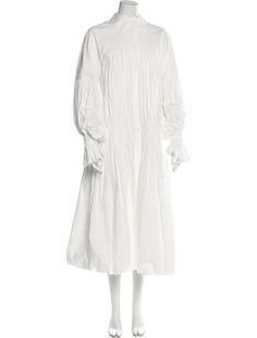 Khaite ShirtdressWhitePleated AccentsLong Sleeve with CollarButton Closure at FrontDesigner Fit: Dresses by Khaite typically fit true to size. White Fall Dress With Gathered Sleeves, White Fall Dresses With Gathered Sleeves, White Dresses With Gathered Sleeves For Fall, White Shirt Dress For Daywear In Fall, White Casual Dress With Pleated Sleeves, White Shirt Dress For Fall Daywear, Casual White Dress With Pleated Sleeves, White Fall Shirt Dress For Daywear, White Billowy Dress For Daywear