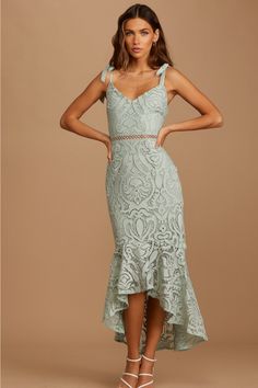 The Lulus Won Your Heart Sage Green Lace Tie-Strap High-Low Midi Dress is full of romance, so it's no wonder we're swooning! Lovely embroidered lace creates a V-neckline and a darted bodice, all supported by tying straps. A panel of sheer crochet lace creates the fitted waist above a figure-skimming midi skirt that ends in a high-low trumpet hem. Hidden back zipper/clasp. Fit: This garment fits true to size. Length: Knee to mid-calf length. Size medium measures 46" from adjustable straps to hem. Sleeveless Midi Dress With Adjustable Straps For Wedding, Midi Wedding Dress With Adjustable Straps, Lace Wedding Dress With Adjustable Straps, High Low Midi Dress, Lace Tie, Adhesive Bra, Flattering Dresses, Lace Midi, Green Lace