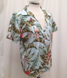 Womens Aqua & Coral Pink Aloha Shirt, Tropical Ginger Flowers on Hawaiian Blouse. Gorgeous Vibrant full-color images in just the right color combo to make you look your best. * Fitted short sleeve shirt with a notched lapel and button up front closure. * Made of high-quality 100% quick dry polyester poplin * Lightweight and breathable * Hand Wash with Delicate Soap and Hang Dry * Available in sizes from XS up to 3XL This fabric pattern is available by the yard at our custom fabric ETSY shop: Green Short Sleeve Summer Shirt, Green Floral Print Short Sleeve Hawaiian Shirt, Summer Short Sleeve Graphic Print Blouse, Summer Short Sleeve Blouse With Graphic Print, Green Short Sleeve Blouse For Beach, Summer Short Sleeve Printed Tops, Multicolor Floral Print Short Sleeve Camp Shirt, Hawaiian Collared Tops With Graphic Print, Graphic Print Short Sleeve Blouse For The Beach