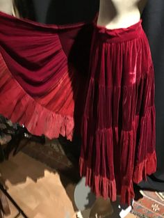 "Exceptional and rare, full circle skirt made with 4 different kinds of velvet: panne' and silk velvet, in Scarlet red and burgundy. TONS of material. Unlined. Closes with side hooks. Waist measures 26\" around. Length from waist to hem is 32\"." Fitted Bohemian Skirt For Dance, Bohemian Fitted Skirt For Dance, Fitted Bohemian Maxi Skirt For Fall, Full Length Fitted Bohemian Skirt, Red Fitted Maxi Skirt For Festival, Red Bohemian Maxi Skirt For Festival, Fitted Red Maxi Skirt For Festival, Bohemian Full-length Skirt For Festivals, Full Length Bohemian Skirt For Festival