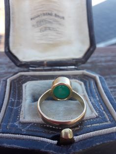 Beautiful 22k Yellow Gold Colombian Emerald, Custom made ring...size 6. Perfect Vintage Pre Owned Condition . Antique Box for Display Only. Emerald color in depend on Lighting. Vintage Cabochon Emerald Ring For Anniversary, Antique Cabochon Emerald Ring Gift, Art Deco Cabochon Rings For Weddings, Art Deco Cabochon Wedding Rings, Antique Cabochon Emerald Wedding Ring, Heirloom Cabochon Emerald Ring For Wedding, Heirloom Emerald Cabochon Wedding Ring, Heirloom Cabochon Emerald Wedding Ring, Vintage Cabochon Emerald Ring For Wedding