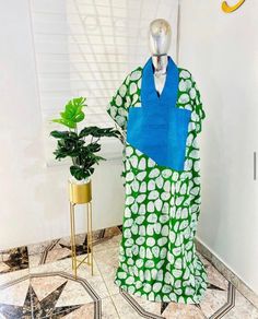 Show up to any event or party with this tribal Nigerian Mix Match dress rich in African Heritage & handwork. Made from premium Adire Cotton fabric. A fabric that is hand dyed in Nigeria. This African Kampala Kaftan can be worn as : Asoebi Dress, Wedding Dress, Bridesmaids Robe Bubu, Church outfits, Dinner, Girls day out, etc ✴️ DETAILS - Loose fit - Silhouette: Oversize & free - Length: 60 inches (can be adjusted shorter to your desired length) - At the neck we have a contrasting cotton fabric. Green Traditional V-neck Dress, Traditional Green V-neck Dress, Green Bohemian Kaftan For Traditional Ceremonies, Traditional Green Dress With Kimono Sleeves, Multicolor Bohemian Kaftan In Ankara Fabric, Green Batik Print Dress For The Beach, Traditional Green Kaftan With Batik Print, Green Floor-length Maxi Dress For Traditional Ceremonies, Green Kaftan With Traditional Patterns