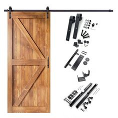 an open wooden barn door with hardware and tools on the bottom, next to it