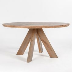 a round wooden table with two crossed legs