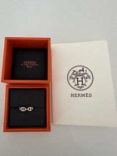 Wow, this is stunning. Very, very hard size to find they are always sold out. I’m also listing another ring if interested. This is guaranteed authentic as I personally purchased from the actual Hermes store Copy of original receipt with my personal information crossed out will be provided with the hermes receipt holder This is Rose gold Size 55 18 karat gold Comes with box as pictured Also comes with HERMES gift bag This has never been one Please note I do not overcharge in shipping. I do not usually even charge enough because insurance is put onto the package. Hermes Gift, Receipt Holder, Hermes Store, Ring Pictures, Gift Bag, Insurance, Jewelry Rings, Ring Size, Fine Jewelry