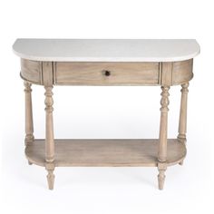 a white marble top table with two drawers on one side and an open drawer on the other