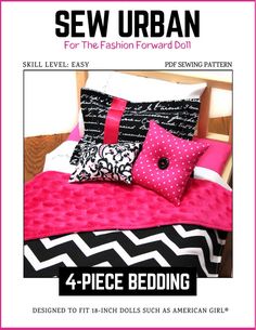 a bed with pink, black and white pillows on it's cover is shown