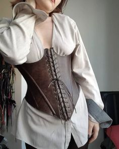 Custom made size corset  Renaissance , viking and warrior women style cup off underbust leather corset belt. For Fan fest festival, burningman, game cosplay,  ren fair, birthday party, barcelehor party etc. Hello. This is Aylin, The creator of the Supermoonax brand.  I design and produce all the products on my page.  I took all the photos.  I would like to try to deliver the products to you in the best  *Its adjustable size with ropes *Corset made as narrow as 10 percent of your waist measuremen Corset Diy, Fantasy Vintage, Leather Corset Belt, Larp Costume, Leather Armor, Vintage Corset, Wide Leather Belt, Leather Carving, Corset Belt