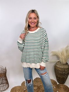 Sage Striped Thermal Oversized Long Sleeve Lightweight Pullover Get cozy this fall with our Sage Striped Thermal Oversized Long Sleeve Pullover! This fall favorite combines style and comfort with its relaxed, oversized fit and warm thermal fabric. The soft sage and cream stripes, accented with a subtle hint of pink, make it a standout piece for the season. Perfect for layering over your favorite jeans or leggings, this pullover can be dressed up with a skirt and ankle boots or kept casual for th Thermal Fabric, Autumn Walk, Crisp Autumn, Peach Love, Oversized Long Sleeve, Weekend Brunch, Graphic Tops, Lounge Shorts, Fall Favorites