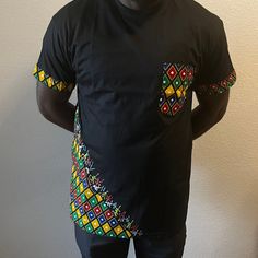 100% Cotton African Pocket shirt in three colors white, black, yellow. Black Summer Tops With Pockets, Cotton Short Sleeve Shirt With Side Pockets, Cotton Shirt With Side Pockets And Short Sleeves, Casual Cotton Shirt With Side Pockets, Black Short Sleeve Cotton Shirt, Cotton Top With Sleeve Pocket For Summer, Casual Yellow Tops With Pockets, Casual Yellow Top With Pockets, Black Cotton Short Sleeve Shirt