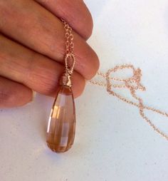 Handmade Morganite stone pendant Necklace. Peach pink Beryl Morganite.  14k gold. Teardrop. Elegant Feminine jewelry. Gifts under 100.  Very large, faceted, peach Morganite gem stone hand wrapped and suspended on gold chain, which is standard 18" long and can be adjusted for you free if charge from 12 to 22" long. Gorgeous, micro faceted stone is pretty big and measures about 19 ct.  The stone is approximately 26 x 10 mm.  I can make a set for you per request. Matching earrings https://www.etsy. Elegant Pink Wire Wrapped Crystal Necklace, Peach Teardrop Jewelry For Gifts, Morganite Teardrop Jewelry Gift, Teardrop Morganite Jewelry Gift, Elegant Pink 14k Gold Filled Necklaces, Elegant Pink 14k Gold-filled Necklace, Elegant Pink 14k Gold Filled Necklace, Elegant Handmade Rose Gold Crystal Necklace, Gold Morganite Jewelry Gift