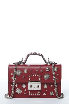 Hollywood Burgundy Studded Leather Crossbody Purse with Removable Chain with silver metal stud appliqués on the front of the bag and top handle. Secured by a polished silver metal push lock on the front flap, this structured fashion purse includes an interior zipped pocket and a slip pocket keeping all your essentials organized. Structured Fashion, Leather Crossbody Bag Small, Purse Styles, Studded Leather, Small Purse, Crossbody Purse, Coach Dinky Crossbody