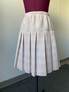 "late 70s, early 80s preppy plaid polyester fortrel skirt. This has an elastic waist, some stretch to the fabric Condition: excellent Labels/tags: only the info tag which can be seen in pictures. No name label Measurements: taken flat -waist  26-30\" waist -hip 40\" hip taken 7\" down -overall length 21 1/4\"  *To ensure a great fit, we recommend comparing the measurements above to a similar garment you own and love to wear, as sizing varies across the decades.  *All of my pieces are vintage and may have some wear. I will show or mention defects in the photos and/or the description. Please reach out for clarification or more pictures. Welcome to The Darning Darling Shop! My store is new to Etsy, and I am excited to offer you amazing new vintage finds. Thank you for shopping and please reac 80s Preppy, Kilt Skirt, Preppy Plaid, Name Label, Prep Style, Style Preppy, Style Skirt, Beautiful Skirts, Professional Outfits