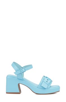 A squared-open toe and a block heel make this sandal a perfectly poised option for any occasion. 3" heel Adjustable ankle strap with buckle closure Textile upper and lining/synthetic sole Imported Blue Ankle Strap Heels With Buckle Closure, Blue Open Heel Block Heels With Stacked Heel, Blue Block Heels With Stacked Open Heel, Blue Sandals With Buckle Closure, Blue Block Heels With Heel Strap And Open Heel, Blue Open Heel Heels With Buckle Closure, Blue Open Heel Shoes With Buckle Closure, Spring Sandals With Padded Heel And Rectangular Buckle, Blue Open Toe Block Heels With Stacked Heel