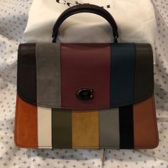 Brand New, Never Used Coach Purse. Detachable Strap-Can Be Worn As Shoulder Bag,Cross Body Or Hand Bag. Comes With Dust Bag. Designer Multicolor Satchel With Top Carry Handle, Designer Multicolor Top Handle Satchel, Designer Multicolor Satchel With Detachable Strap, Elegant Multicolor Shoulder Bag With Detachable Strap, Elegant Multicolor Travel Satchel, Multicolor Formal Satchel Bag, Elegant Multicolor Crossbody Satchel, Multicolor Satchel For Formal Occasions, Designer Multicolor Crossbody Satchel