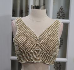 Elegant Bead work Blouse across entire blouse in Gold and Pearl color.size:36 Elegant Sleeveless Blouse With Pearl Embroidery, Fitted Beaded V-neck Blouse, Elegant Beaded V-neck Tops, Sleeveless Beaded Tops For Wedding, Elegant Embellished Sleeveless Blouse, Fitted Sleeveless Top With Pearl Embroidery, Bead Work Blouse, Pearl Blouse, Fashion Walk