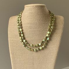 A double strand necklace of fresh water pearls dyed a lovely spring green brighten up your neckline for spring!  Coin shaped, and finished with a gold filled box clasp and safety catch. Double Strand Pearl Necklace, Coin Pearl Necklace, Double Strand Necklace, Cultured Pearl Necklace, Coin Pearls, Bee Earrings, Fresh Water Pearls, Box Clasp, Disc Necklace