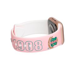 a pink wristband with an apple watch in the center and a cartoon character on it