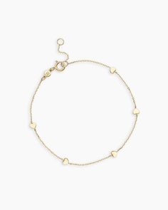 Achieve a truly timeless look with the 14k Gold Heart Bracelet. This beautiful solid gold chain bracelet features dainty heart details, making it the perfect addition to your daily stack. To wear, stack alongside other solid gold or diamond bracelets. More is more! Heart Bracelet in 14k Solid Gold, Women's by gorjana 14k Gold Bracelet With Heart Charm For Everyday, Everyday 14k Gold Bracelet With Heart Charm, Delicate Yellow Gold Heart Bracelet With Charm, Delicate Yellow Gold Heart Charm Bracelet, 14k Gold Heart Charm Bracelet, Fine Jewelry, 14k Gold Heart Charm Bracelet Fine Jewelry, 14k Yellow Gold Chain Bracelet With Heart Charm, Elegant Everyday Chain Bracelet With Heart Charm, Dainty 14k Gold Bracelets With Heart Charm