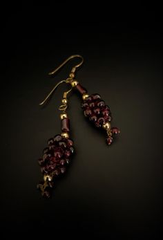 Garnet Beads_ Style: Grape Cluster_ Design Earrings with French wires Handmade Briolette Earrings For Formal Occasions, Elegant Gold Earrings With Polished Beads, Elegant Czech Glass Chandelier Dangle Earrings, Handmade Briolette Earrings For Party, Elegant Gold Beaded Earrings With Faceted Beads, Elegant Czech Glass Jewelry With Dangling Beads, Elegant Polished Beads Earrings For Party, Elegant Party Earrings With Polished Beads, Formal Beaded Dangle Earrings