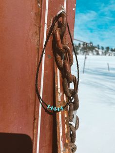 Black seed bead choker with turquoise and silver beads Southwestern Beaded Chain Jewelry For Festivals, Southwestern Style Beaded Chain Jewelry For Festival, Southwestern Style Festival Jewelry With Beaded Chain, Bohemian Black Beaded Choker Jewelry, Tiny Beads Southwestern Jewelry, Southwestern Style Black Bead Jewelry For Gifts, Southwestern Style Black Beads Jewelry For Gift, Black Bohemian Turquoise Necklace Gift, Bohemian Black Turquoise Necklace As Gift