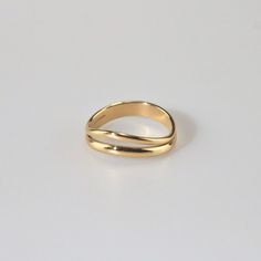 Modern yet timeless, the gold wave ring features a split shank. It is the stylish but simple piece you've been looking for. Wear it alone or stack with other rings to make a statement look. 18k gold plated Stainless steel based Waterproof and tarnish free Available in US size 6-8 Ring sizing chart Rings To Make, Gold Wave Ring, Gold Rings Simple, Gold Waves, Gold Ring Designs, Wave Ring, Everyday Rings, Split Shank, Gold Plated Rings