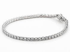 Pre-Owned Bella Luce ® white diamond simulant 9.58ctw round, rhodium over sterling silver bracelet. Measures approximately 7 1/4"L x 1/8"W and has a hidden box closure. The diamond equivalent weight is 6.16ctw..  This product may be a customer return, vendor sample, or on-air display and is not in its originally manufactured condition.  It may not be new.  In some instances, these items are repackaged by JTV. Sterling Silver Bracelet With Pave Diamond Setting, White Gold Diamond Bracelet With Pave Setting, Dazzling Round Diamond Bracelet With Pave Setting, Classic Pave Setting Tennis Bracelet, Dazzling Platinum Bracelet With Diamond Accents, Anniversary White Gold Tennis Bracelet With Pave Setting, Silver Diamond Bracelet In Platinum, Round Cut, Dazzling Platinum Bracelets With Diamond Accents, Silver Platinum Diamond Bracelet With Round Cut