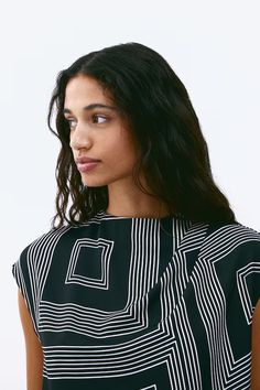 Draped blouse - Short sleeve - Long - Black/patterned - Ladies | H&M US Elegant Summer Top With Cap Sleeves, Elegant Cap Sleeve Tops For Summer, Summer Workwear Top With Asymmetrical Neckline, Chic Cap Sleeve Tops For Summer, Spring Short Sleeve Tops With Structured Shoulders, Chic Asymmetrical Neckline Top For Work, Casual High Neck Blouse For Workwear, Casual High-neck Blouse For Workwear, Structured Tops For Summer Workwear