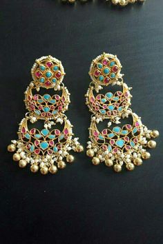 Kundan Earrings and Statement Kundan Jewelry for Indian as well as Pakistani Brides. *It is a pair of Handmade Indian Ethnic Kundan Earrings with Multi color Real Kundan Stones. *Its made from Silver and Copper, Turqoise,Pink and White Kundan Stones Settings with 22k gold Plating. *It gives Pure Ethnic Look with Antique Touch and is 3.3 Inches Long. *Our all jewelry is made from semiprecious stones and beads. *WARRANTY: ITS GENUINE HANDMADE JEWELRY AND WE ARE GIVING LONG LIFE WARRANTY FOR OUR AL Kundan Chandbali, Desi Jewelry, Pakistani Brides, Indian Wedding Jewelry Sets, Kundan Jewelry, Polki Earrings, Chandbali Earrings, Polki Jewellery, Gold Ring Designs