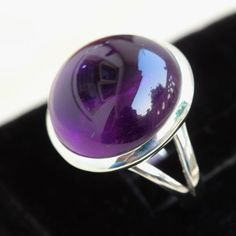 Gemstone - Purple Amethystmetal - sterling silverring size- all sizes availableEach Ring made with Precision and love, these rings are perfect for everyday use and a perfect accessory to wear at work. The same design is also uploaded With Aventurine, Aqua & Blue Chalcedony, malachite, Prehnite, and Tiger eye gemstone. kindly visit my store to view the complete collection. Rings can be customized on request and gemstones can be switched to any other as per requirement. Feel free to contact me Nickel-free Silver Amethyst Ring In Sterling Silver, Purple Oval Cabochon Hallmarked Ring, Silver Amethyst Oval Cabochon Ring, Purple Amethyst Ring In Sterling Silver, Purple Amethyst Ring With Sterling Silver, Amethyst Cabochon Jewelry For Anniversary, Silver Amethyst Ring With Oval Cabochon, Purple Amethyst Ring With Round Stone In Sterling Silver, Purple Sterling Silver Ring With Round Stone