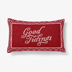 a red and white pillow with the words good things embroidered on it's side