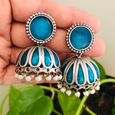 Blue Jhumka/ Blue Meenakari Jhumka/ Oxidized Silver Jhumka Earrings/ Blue Tribal Jhumka/ Designer Earrings/ Indian Ethnic Earrings Description: - Length: 2 Inches - Earring come with Push back Closure - Lightweight Meenakari Jhumka Earrings - Contemporary earrings in silver finish. - Very Elegant and stylish, these earrings can be paired with any traditional Indian or Western Attire depending upon the occasion and the theme. - The base is pure brass which makes this very sturdy and of good quali Cheap Handmade Women's Jhumkas, Blue Tilla Jhumkas For Festivals, Blue Chandbali Jhumkas With Latkans, Blue Jhumkas With Tilla For Festivals, Blue Jhumkas For Festive Occasions, Blue Earrings With Cutdana For Diwali, Blue Chandbali Jhumkas For Diwali, Diwali Blue Jhumkas With Latkans, Blue Jhumkas With Latkans For Diwali