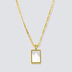 DESCRIPTION & DETAILS Easy to layer and wear every day, this tag necklace is an edgy personal touch to your stack. This necklace features a rectangular tag with beautiful white stone in the center. Plating: 14k Gold Materials: 14K Gold on Stainless Steel, AAA Freshwater Pearl Measurements: Chain Length: 44+5cm, Pendant: 22mm+15mm Hypoallergenic SUSTAINABILITYIn-house plating - All pieces are hand crafted by our in-house jewellers ensuring a high standard of working conditions.Fair pricing - Due White Rectangular Necklace For Everyday, Everyday White Rectangular Pendant Necklace, White Rectangular Minimalist Jewelry, Minimalist White Rectangular Jewelry, Modern White Rectangular Jewelry, Pearl Pendant Necklace, Recycled Sterling Silver, White Stone, Women Supporting Women