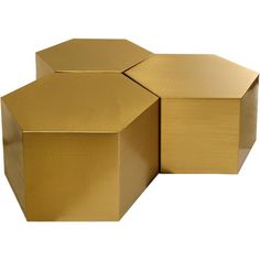 three golden hexagonal boxes sitting on top of each other