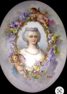 a plate with an image of a woman holding a baby